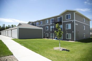 Exterior Legacy Heights building with detached car garage